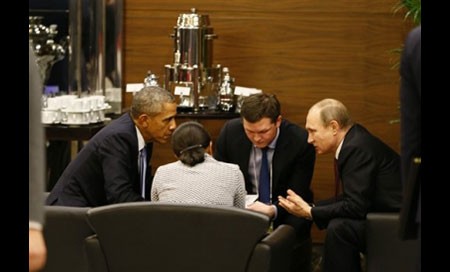 Obama y Putin se reúnen a puerta cerrada en París